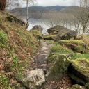 Rocky path with loch behind